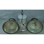 Three large vintage industrial spotlights in metal cases. H.80 W.60cm