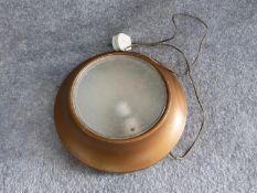 A vintage plinth lamp with textured glass centre panel. Label verso. Diameter 30cm.