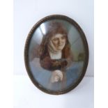 A framed antique miniature painted on ivory of an old woman in a headdress. Signed by artist. Height