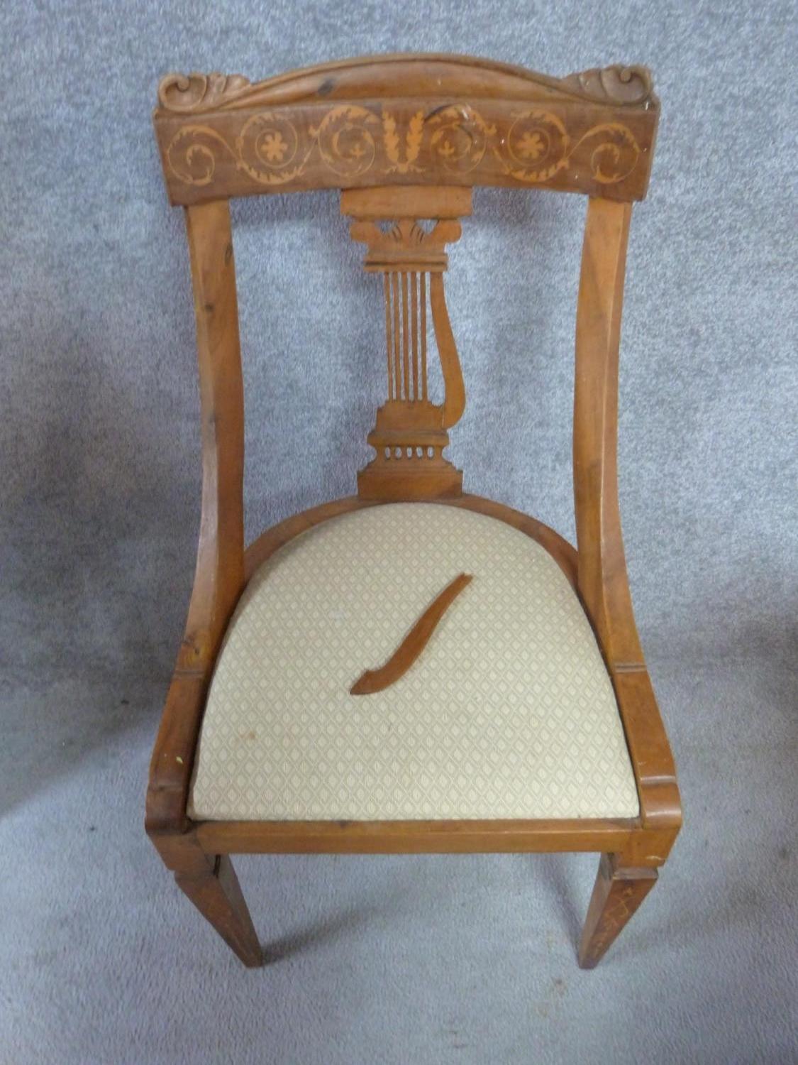 A set of four 19th century Continental walnut and satinwood inlaid chairs, lyre shaped backs on - Image 12 of 12