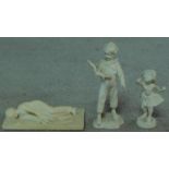 Two white bisque porcelain figures of a young girl and young boy with budgie and a carved marble