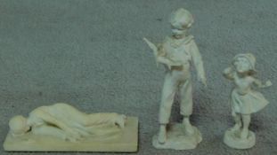 Two white bisque porcelain figures of a young girl and young boy with budgie and a carved marble