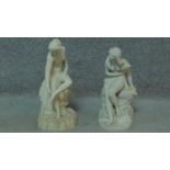 Two 19th century bisque porcelain statues of two sitting ladies. Mark to base. H.39cm (tallest)