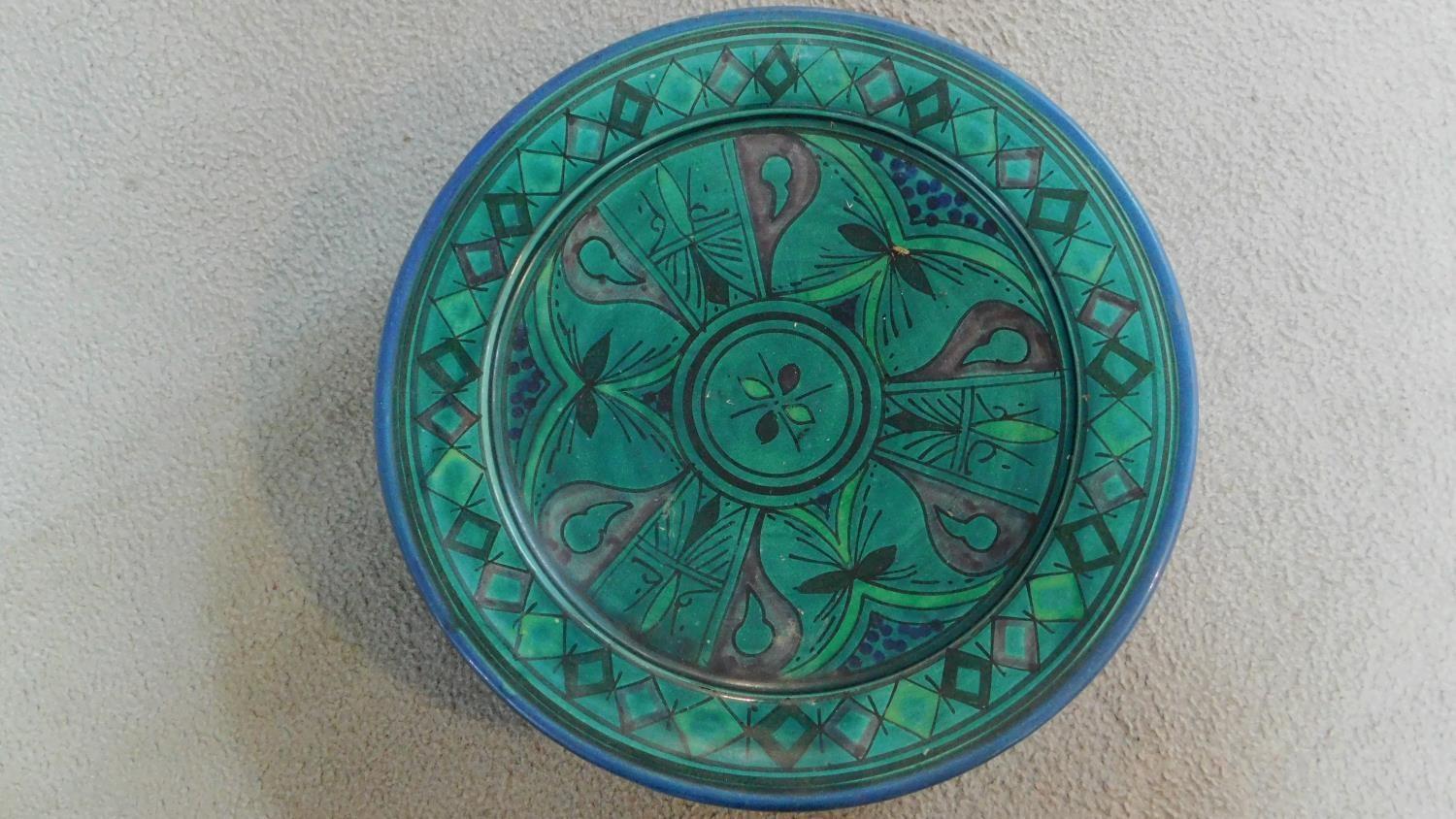 A pair of ceramic glazed plates with bold geometric designs. 39x39cm (largest) - Image 5 of 7