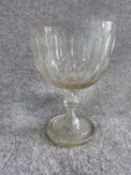 A large Victorian blown glass pedestal bowl/cup with oval cut design and star cut base. H 25.5