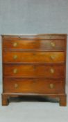 A Georgian mahogany chest of four long drawers fitted with brush slide on bracket feet. H.80 W.74