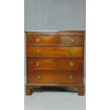 A Georgian mahogany chest of four long drawers fitted with brush slide on bracket feet. H.80 W.74