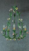 A metal framed six branch chandelier with naturalistic decoration. H.61 W.47cm