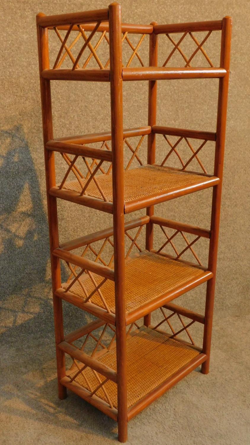 A 20th century teak and rattan whatnot. H.96 W.38 D.25cm - Image 2 of 4