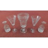 A Victorian engraved glass rummer along with two Victorian engraved trumpet shaped glasses and a