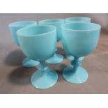 A set of five antique French Portieux Vallerysthal blue opaline glass wine goblets. Height 14.3cm.