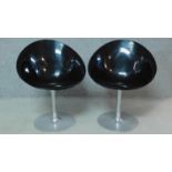 A pair of Vintage black chairs on chrome frame, by Ero (S) Kartell. H.83cm