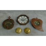 A collection of antique decorative items including two metal framed wax flower crowns, a pair of