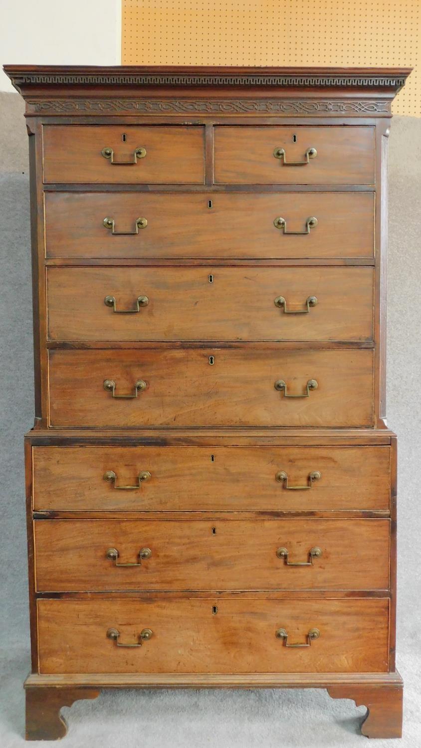 A Georgian mahogany two part chest on chest of two short over six long drawers fitted with