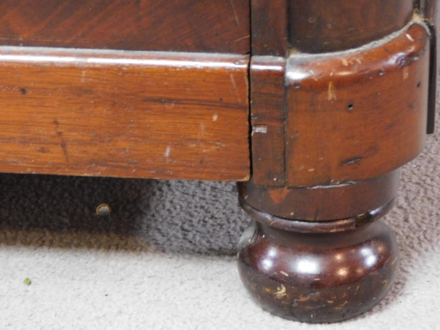 A Victorian mahogany chest of two short over three long drawers, raised on squat turned supports. - Image 5 of 8