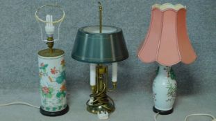 A collection of three vintage lamps, two with oriental vase bases, the other a three branched