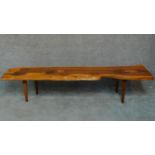 A Vintage natural form yew wood coffee table by Reynolds of Ludlow. H.40 W.104 D.43cm
