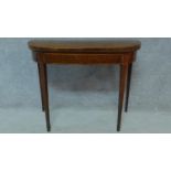 A Georgian mahogany tea table raised on tapering square legs. H.73 W.92 D.90cm