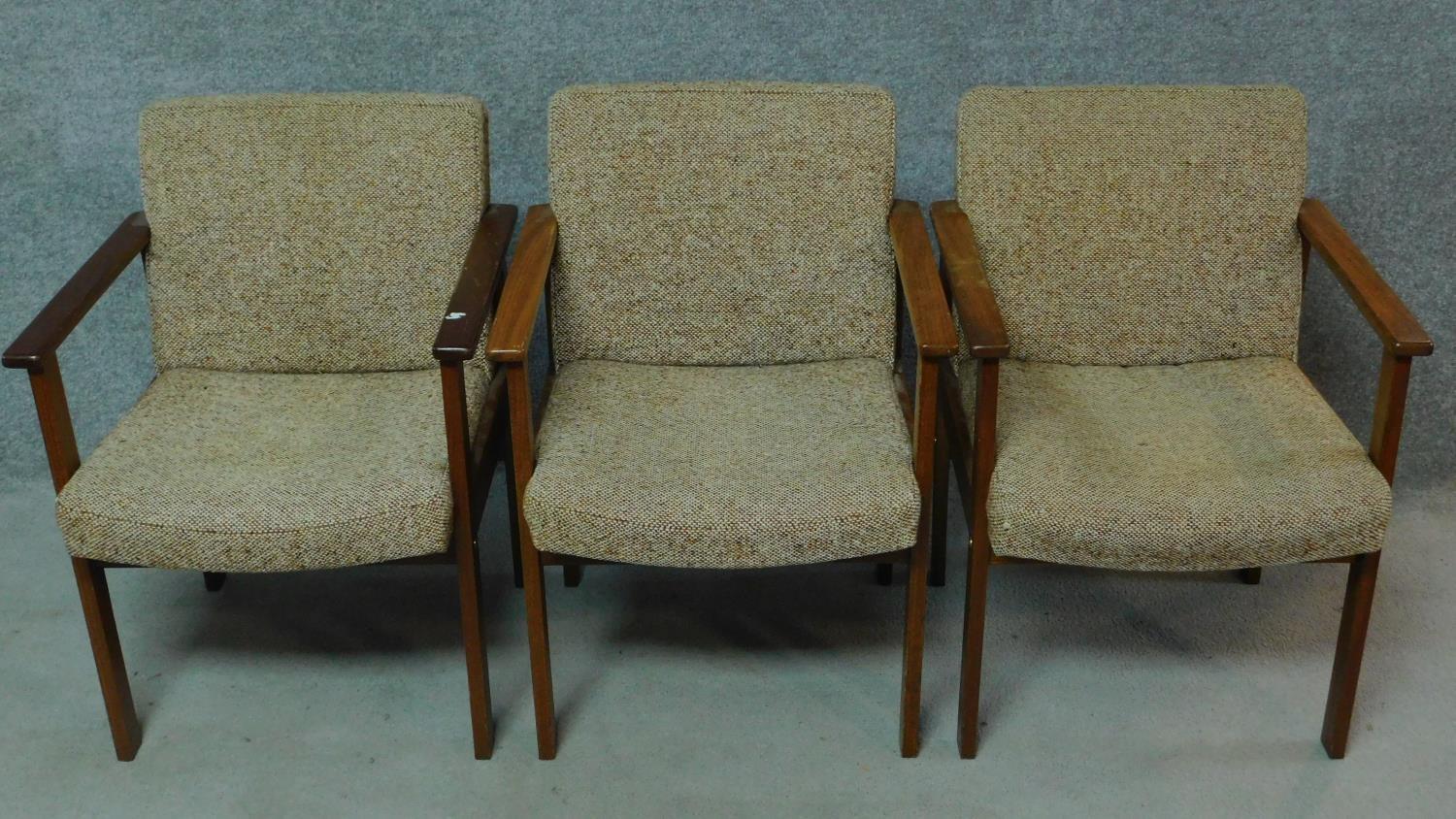 Three vintage teak armchairs with beige upholstery, by Antocks Lairn. H.80cm