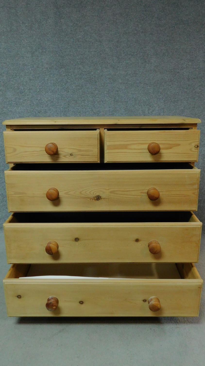 A pine chest of two short over three long drawers. H.92 W.92 D.47cm - Image 2 of 5