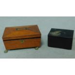 A Japanese black metal jewellery box with raised floral and insect design and a regency satinwood