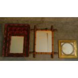 A bamboo effect wall mirror, a painted polychrome mirror and an embossed framed mirror. 52x40cm (