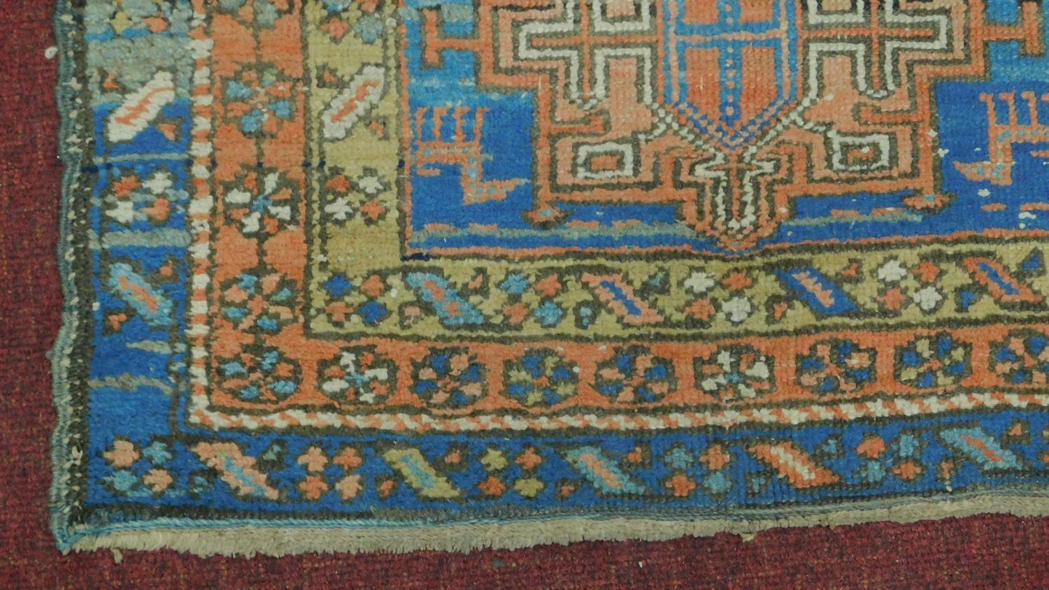 A Persian Heriz style runner, repeating stylised medallion throughout the field guarded by multi - Image 3 of 4