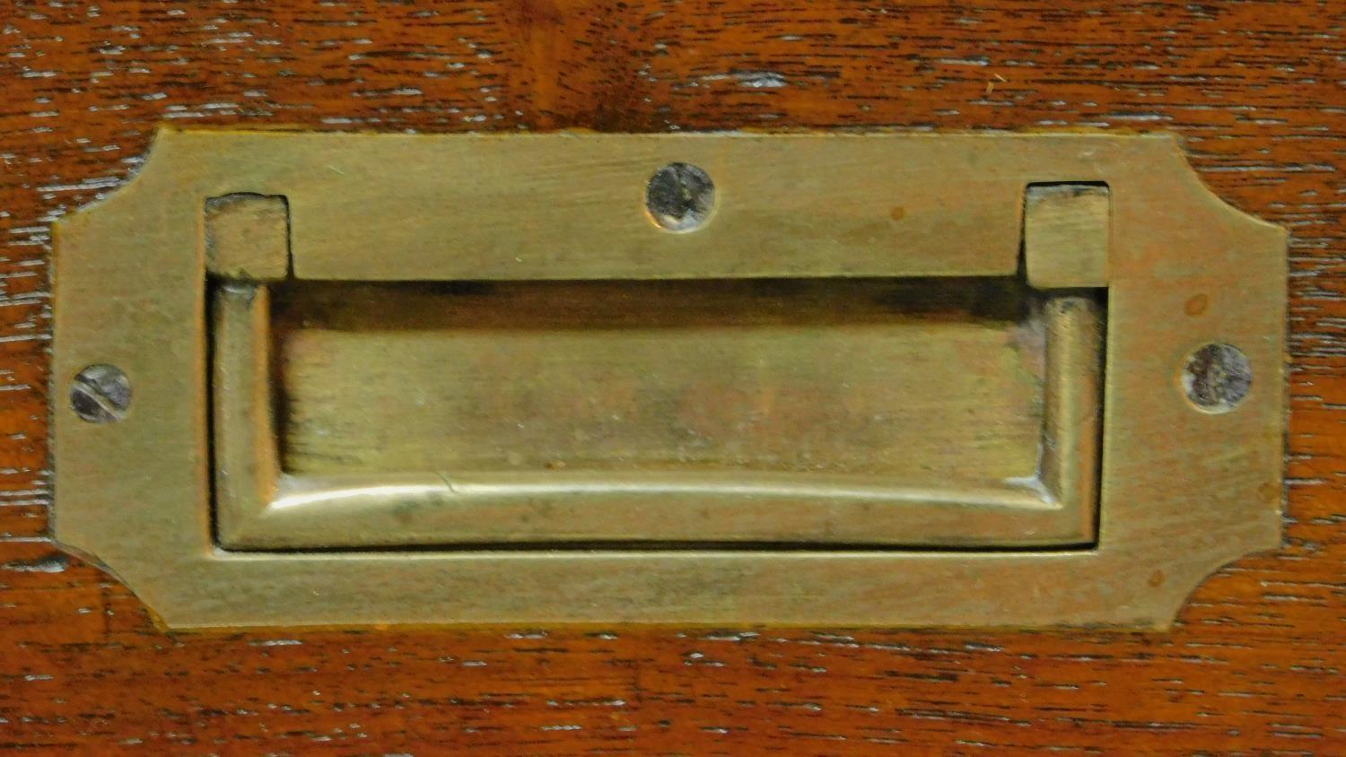 A 19th century teak two part brass bound military campaign chest fitted inset brass handles. H.98 - Image 5 of 7