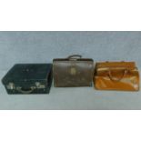 One vintage leather suitcase together with two vintage leather men's bags, one by Antler, one