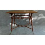 A Victorian walnut occasional table on turned and spiral twist stretchered base on swept brass