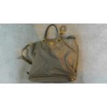 An original Prada woman's grey leather handbag. H.40 W.39cm