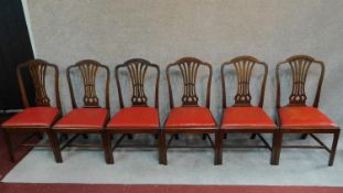 A set of six Georgian mahogany Hepplewhite style dining chairs. H.98cm