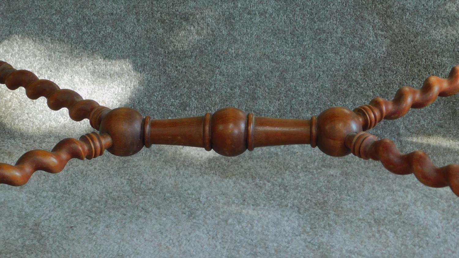 A Victorian walnut occasional table on turned and spiral twist stretchered base on swept brass - Image 4 of 6