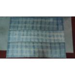 A sedir blue and white tie dye effect rug, some wear in places. 235x172cm
