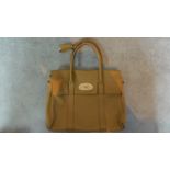 An original beige Mulberry's woman's handbag. H.40 W.32cm