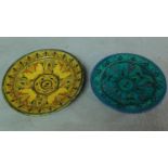 A pair of ceramic glazed plates with bold geometric designs. 39x39cm (largest)