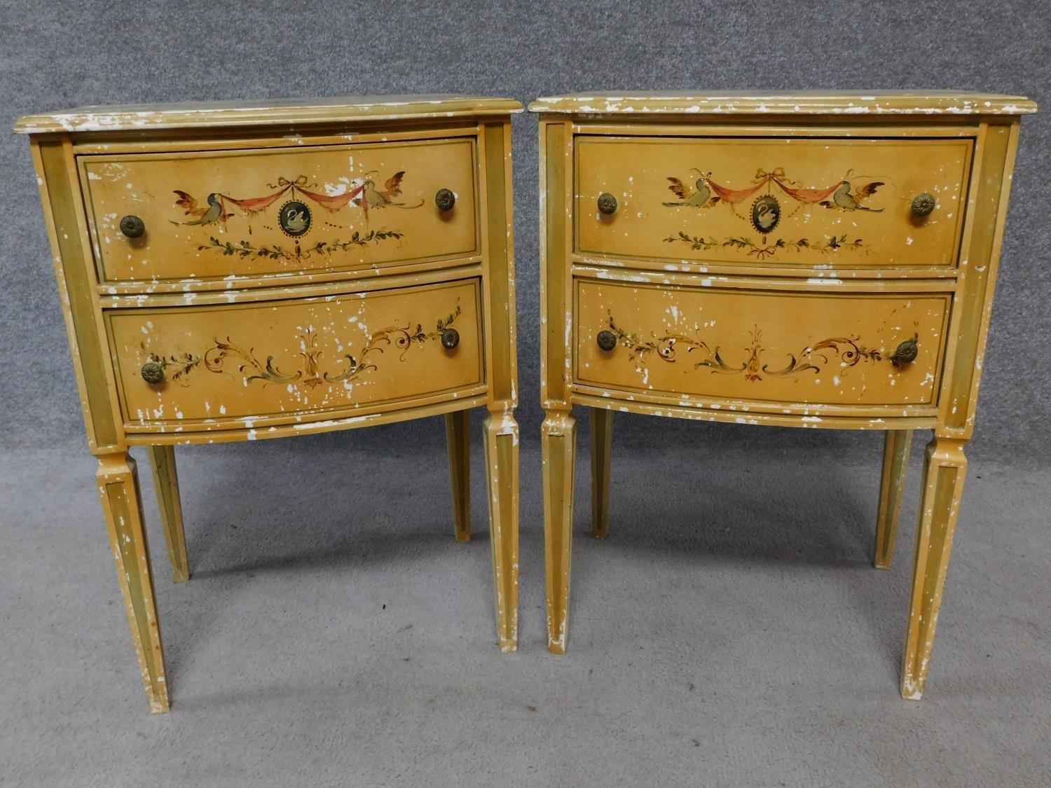 A pair of Italian hand painted bedside cabinets raised on tapering square supports. H.68 W.49 D.39cm