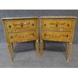 A pair of Italian hand painted bedside cabinets raised on tapering square supports. H.68 W.49 D.39cm