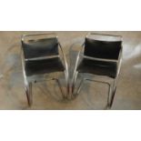 A pair of vintage Mies Van Der Rohe style MR 20 black leather lounge chairs on chrome frames. H.78cm