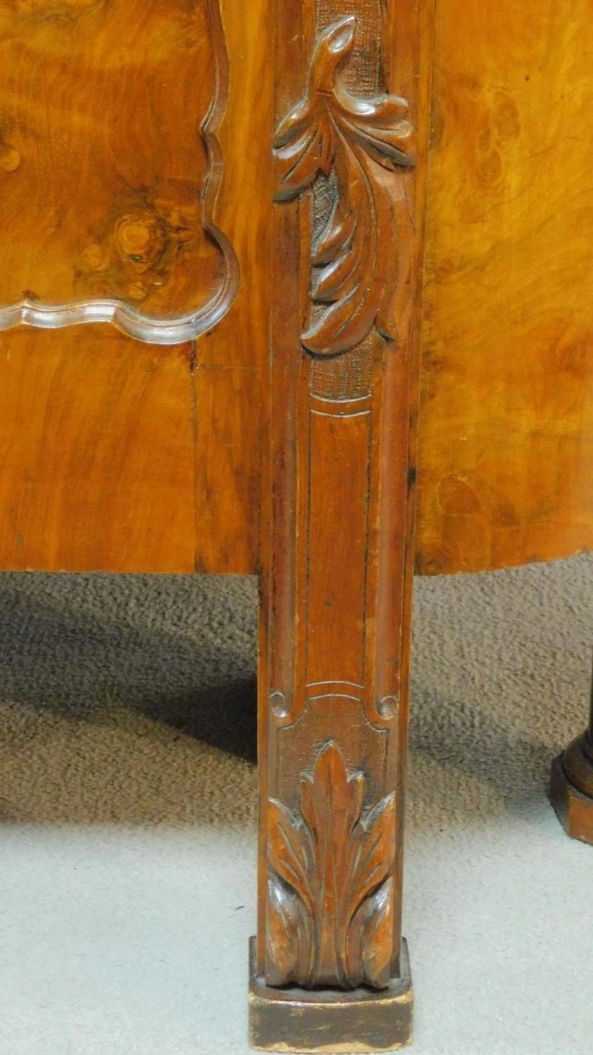 A 19th century French burr walnut nursing bed with floral carvings to the top and to the legs, - Image 6 of 12