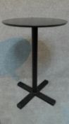 A Pedrali metal tall bistro table painted black. H.74 W.49 D.49cm