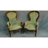 A near pair of French style walnut framed spoon back armchairs on cabriole supports. H.101cm
