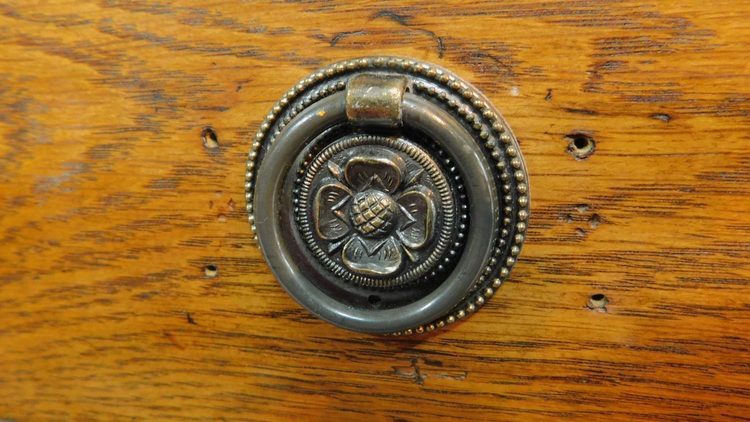 A late 19th century oak three drawer dressing chest with leaf carving and raised on bracket - Image 5 of 12