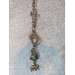 Antique hanging engraved brass Indian animals on a fancy link brass chain with hook at end. Length