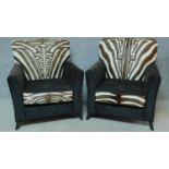 A pair of contemporary pony skin zebra print and black fabric armchairs, by Ninas House. H.92cm