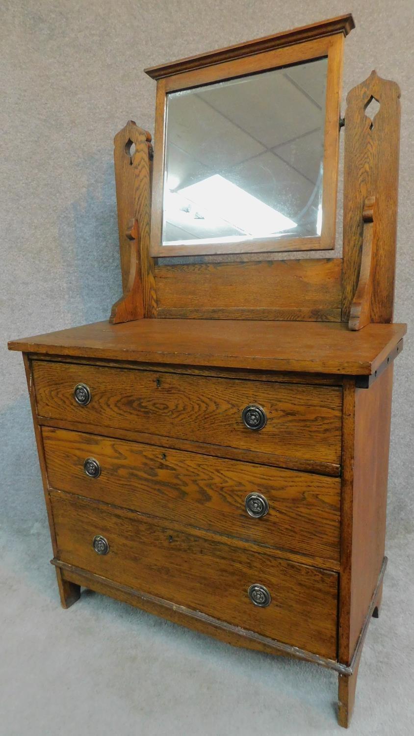 A late 19th century oak three drawer dressing chest with leaf carving and raised on bracket - Image 2 of 12