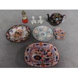 A collection of antique ceramic items. Including a Chinese porcelain plate with character mark to