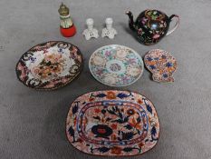 A collection of antique ceramic items. Including a Chinese porcelain plate with character mark to