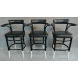 A set of three ebonised bentwood style bar chairs. H.98cm