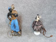 Two vintage lamps. One of a German porcelain doll on a sprung base in silk lace dress, playing the